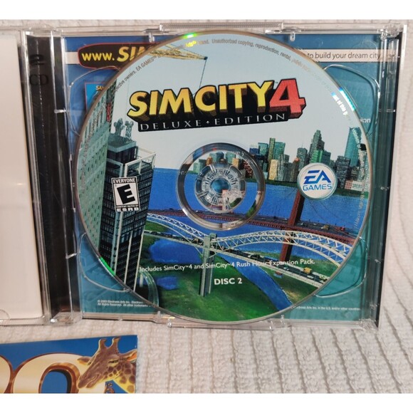 Vintage Lot of 3 items-One Electronic Handheld Game and Two PC Games-Pre Owned - Picture 5 of 16